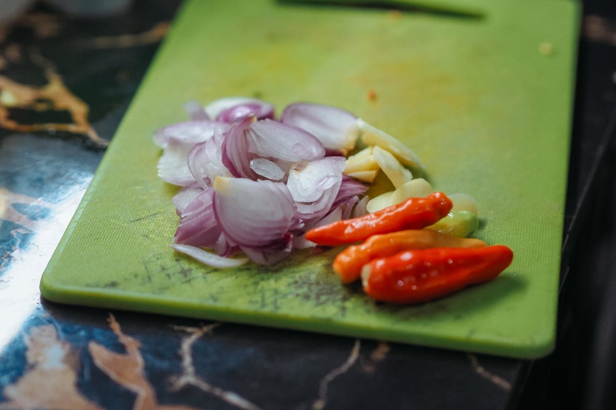 Sliced red onions on a cutting board
