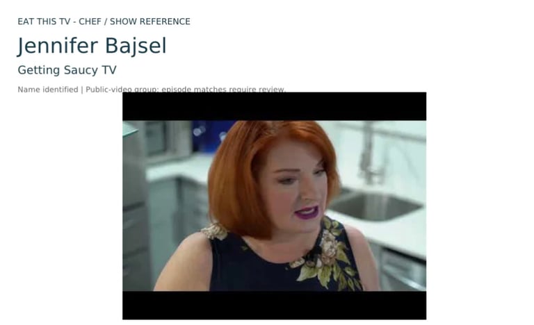 Jennifer Bajsel from Getting Saucy TV, a woman with red hair wearing a dark sleeveless top in a kitchen setting